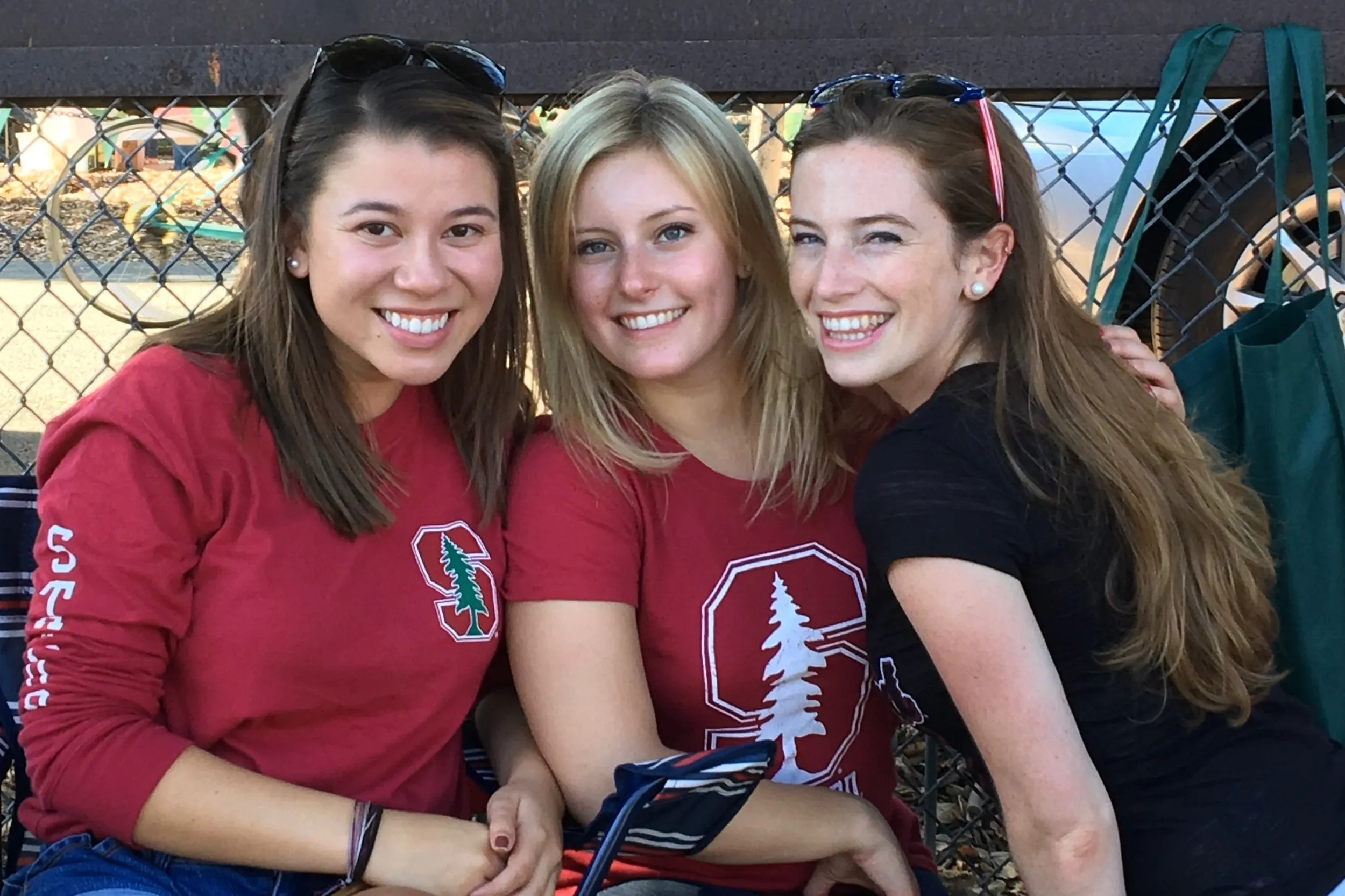 Julia, Kayla and Caroline as first-year graduate students at a 2016 Stanford football game.